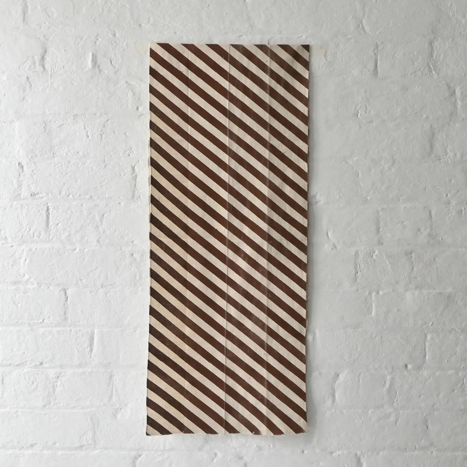 Full view of vintage Japanese white and brown diagonal stripe cotton.