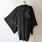 Woven plum blossom, chrysanthemum and peony motifs on vintage black silk haori.
