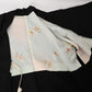 Vintage Japanese women's black silk crepe haori with light blue silk lining.