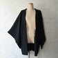Vintage Japanese women's silk haori with black-on-black jacquard chrysanthemum pattern.
