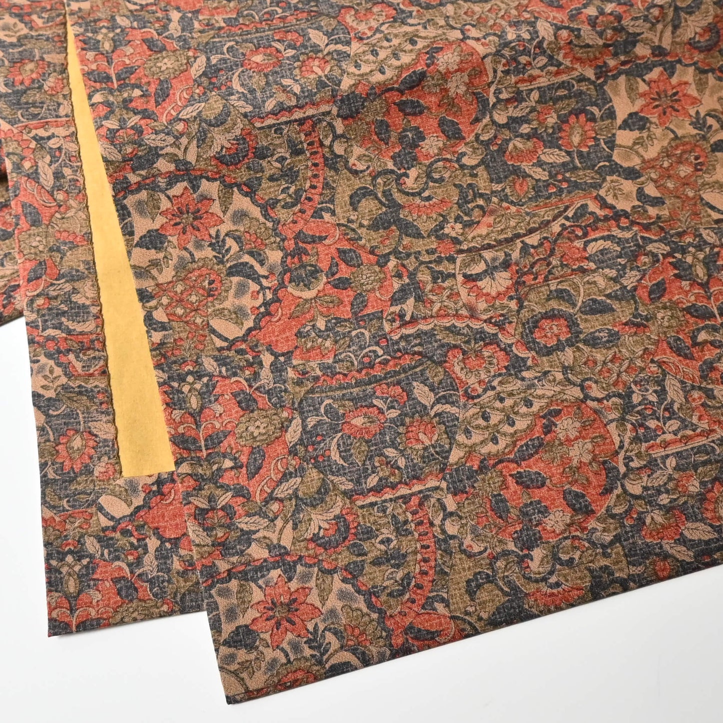 Close-up view of vintage Japanese women's Sarasa design Nagoya obi in muted colour tone.