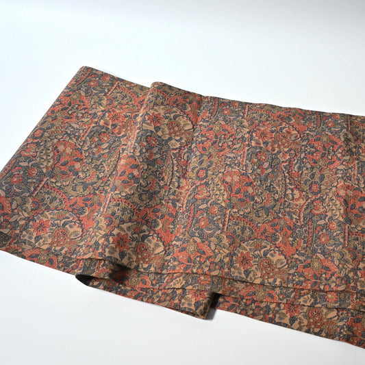 Full view of vintage Japanese women's Sarasa design Nagoya obi in muted colour tone.