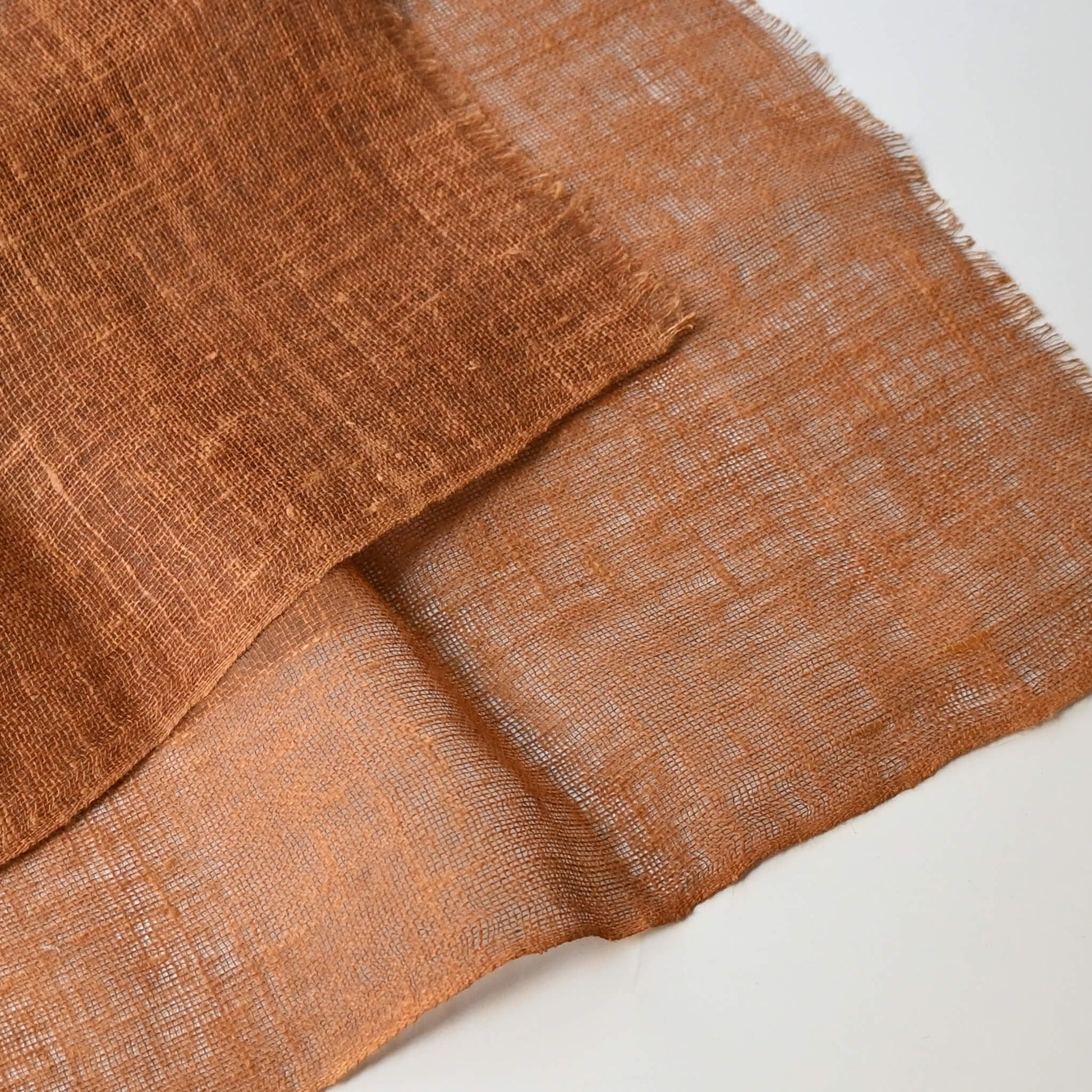 Close-up view of vintage mosquito net Kaya hemp panel dyed with fermented persimmon tannin Kakishibu.