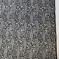Vintage katazome dyed black and white silk crepe with intricate flower and bird motifs.