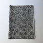 Vintage katazome dyed black and white silk crepe with intricate flower and bird motifs.