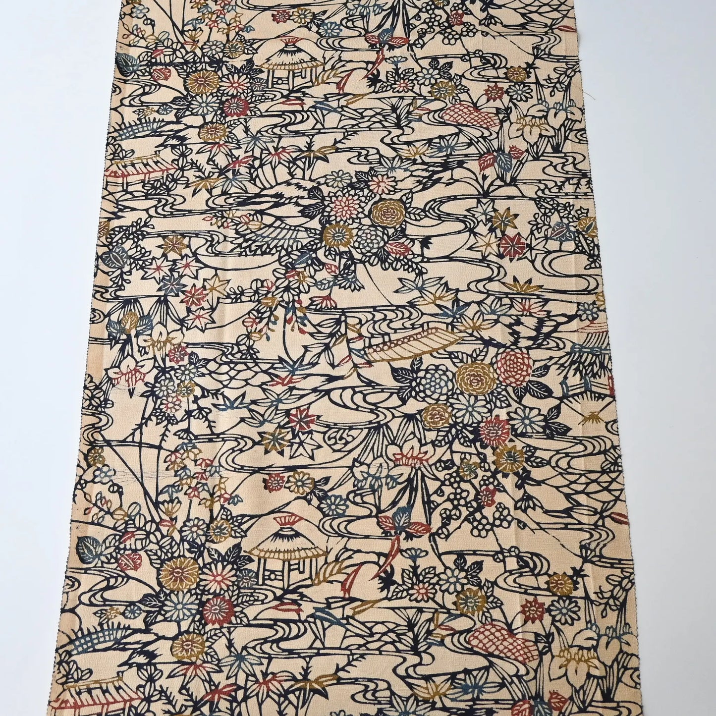 Full view of vintage women's silk crepe kimono fabric piece with Katazome stencil dyed seasonal flowers motif.