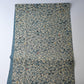 Vintage katazome stencil dyed silk crepe kimono fabric with small floral pattern, including plum blossoms and chrysanthemums.