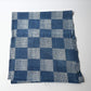 Full view of vintage lightweight soft indigo cotton piece from an old kimono with a large chequered design.