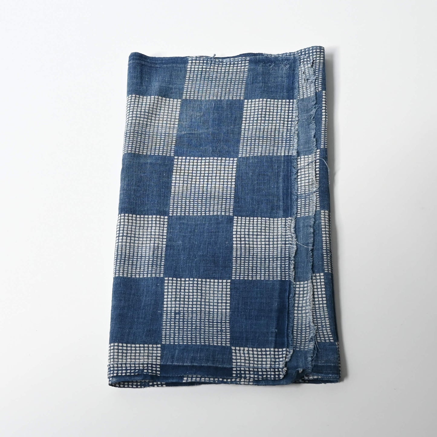 Vintage lightweight soft indigo cotton piece from an old kimono with a large chequered design.