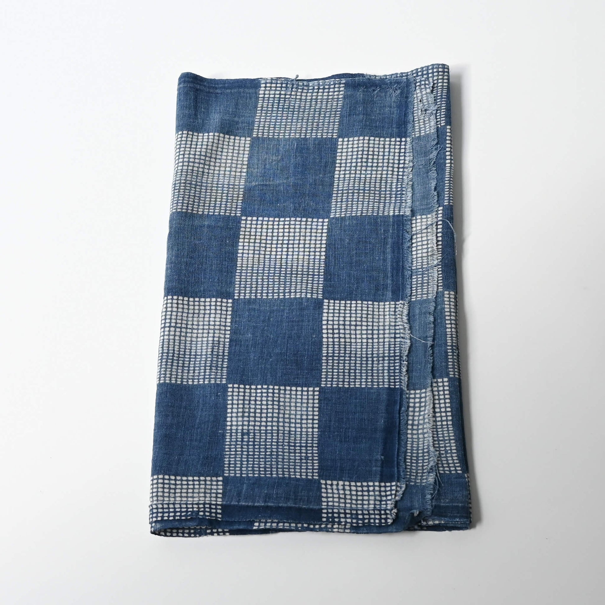 Vintage lightweight soft indigo cotton piece from an old kimono with a large chequered design.