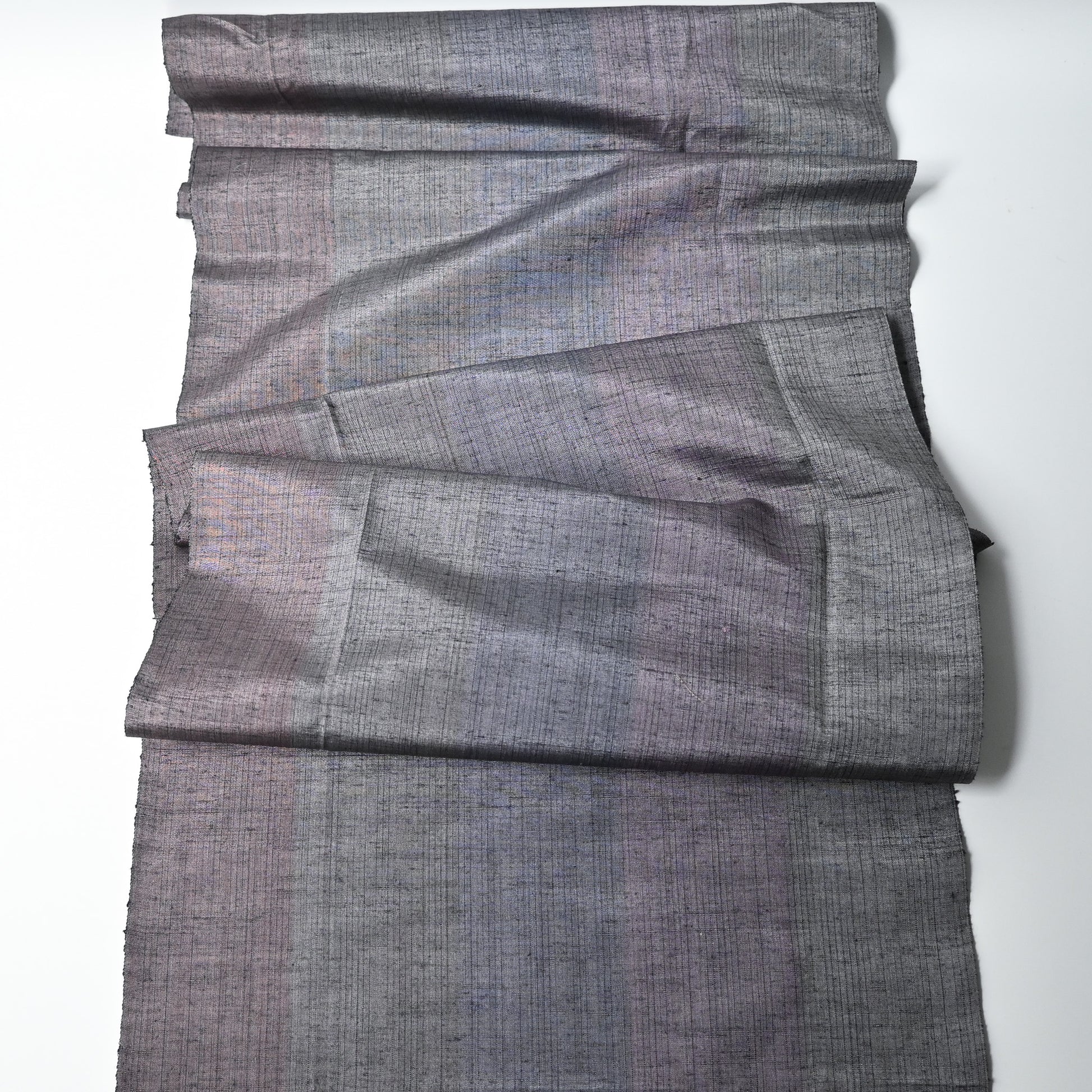 Full view of vintage lilac grey tsumugi silk kimono fabric.