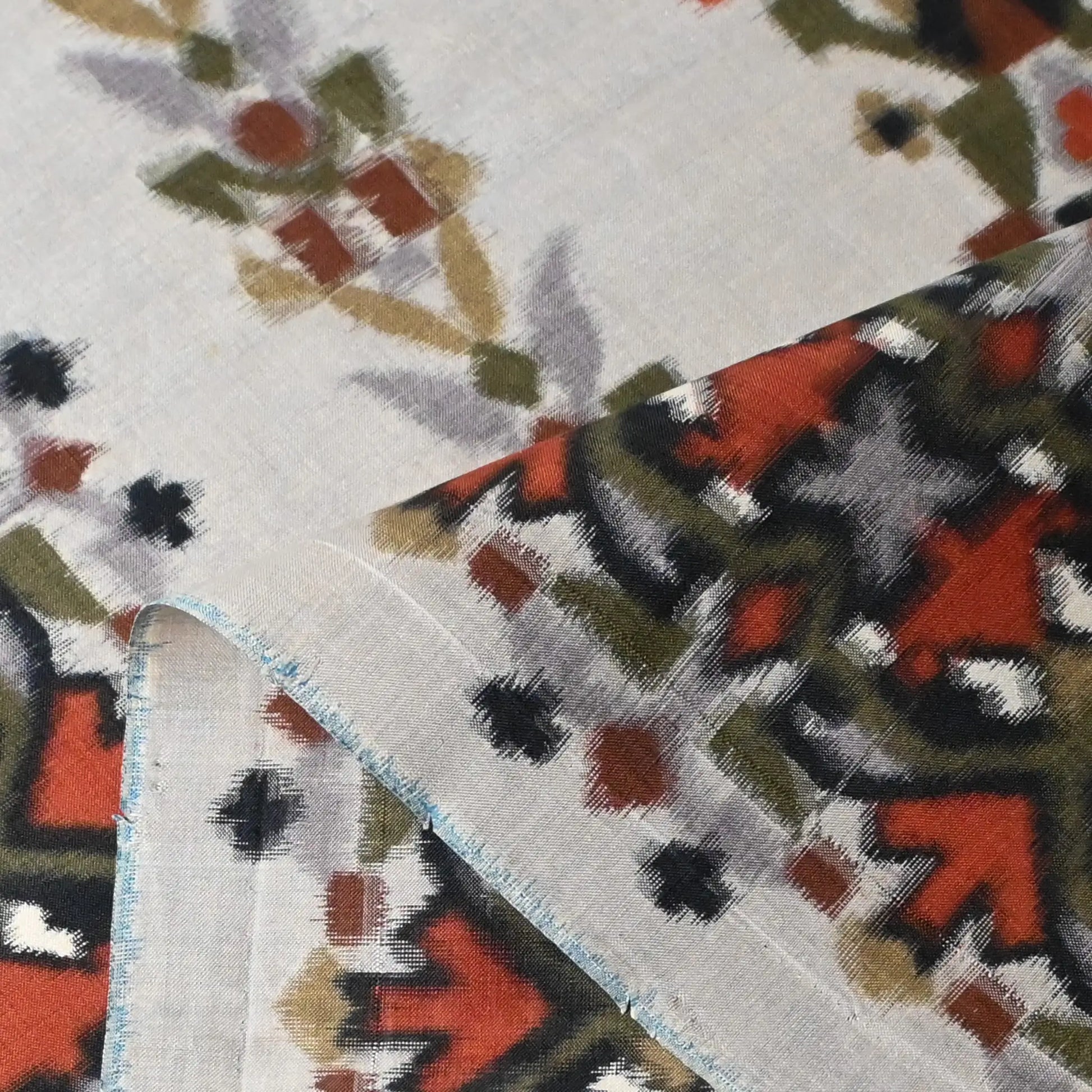 Detailed view of vintage Japanese Meisen kimono silk fabric with Art Deco design from the mid-20th century.