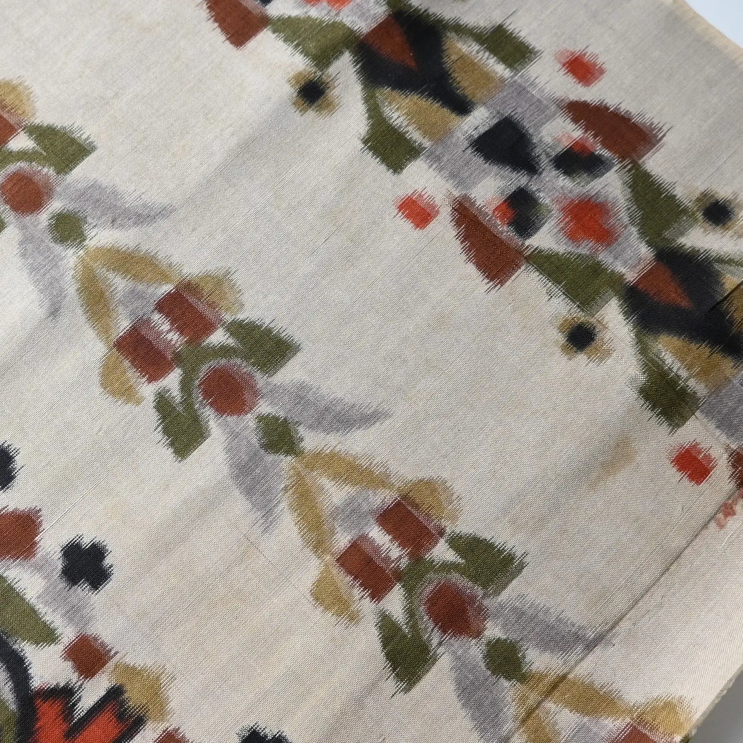Stained part of vintage Japanese Meisen kimono silk fabric with Art Deco design from the mid-20th century.