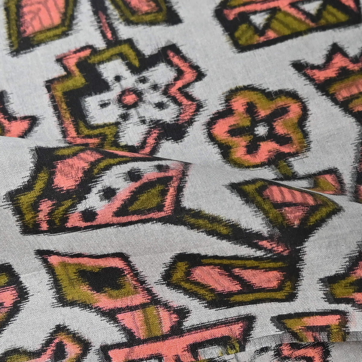 Close-up view of vintage Japanese Meisen silk kimono fabric piece from the mid 20th C, with stylised botanical design.