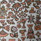 Detailed view of vintage Japanese Meisen silk kimono fabric piece from the mid 20th C, with stylised botanical design.