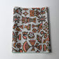 Vintage Japanese Meisen silk kimono fabric piece from the mid 20th C, with stylised botanical design.
