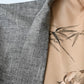 Detailed view of vintage men's grey tsumugi silk haori with hand-painted lining.