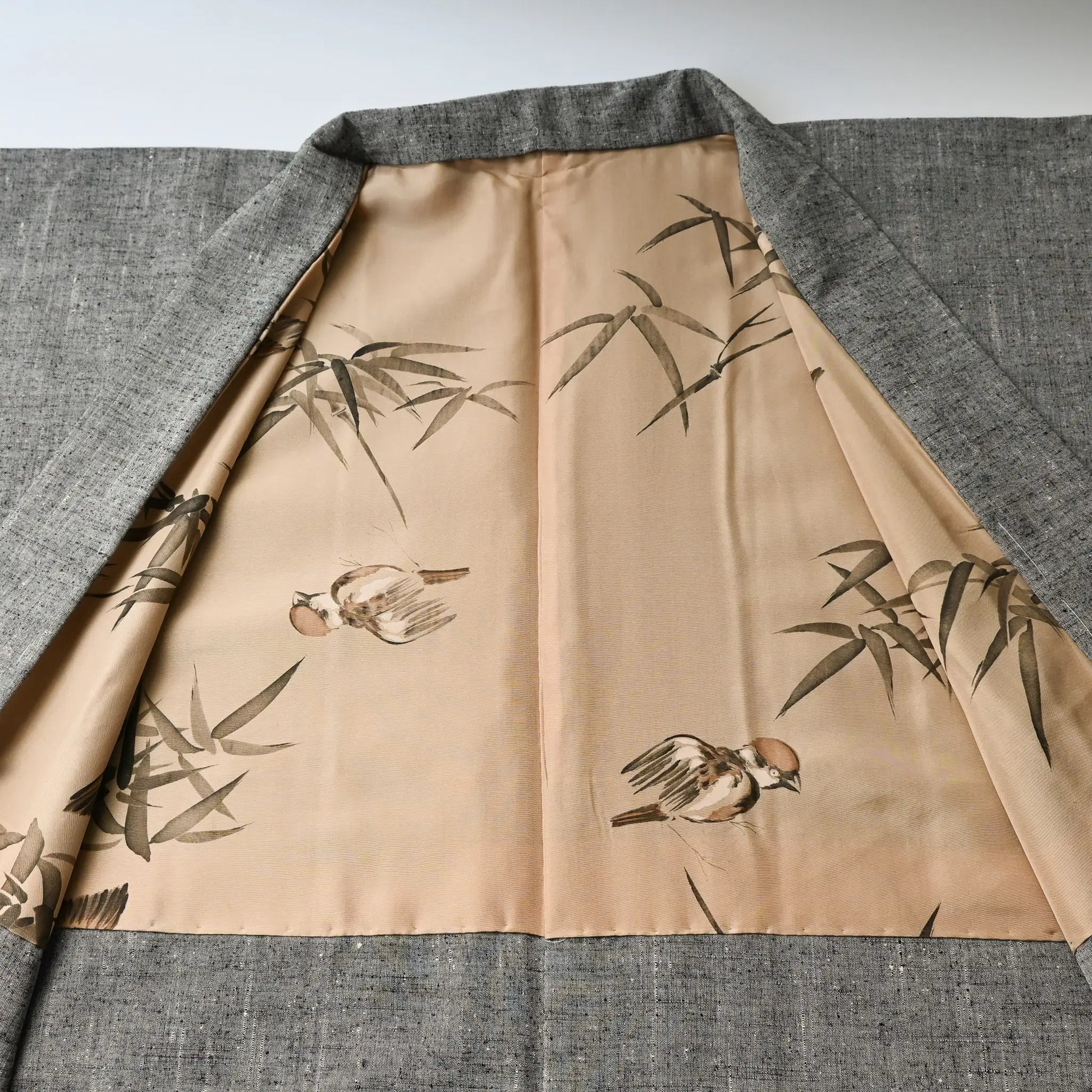 Vintage men's grey tsumugi silk haori with hand-painted lining. bamboo and sparrow.