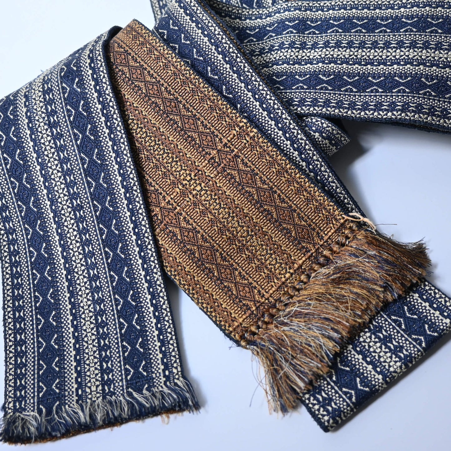 Vintage men's sash kaku obi with woven geometric pattern on both sides.