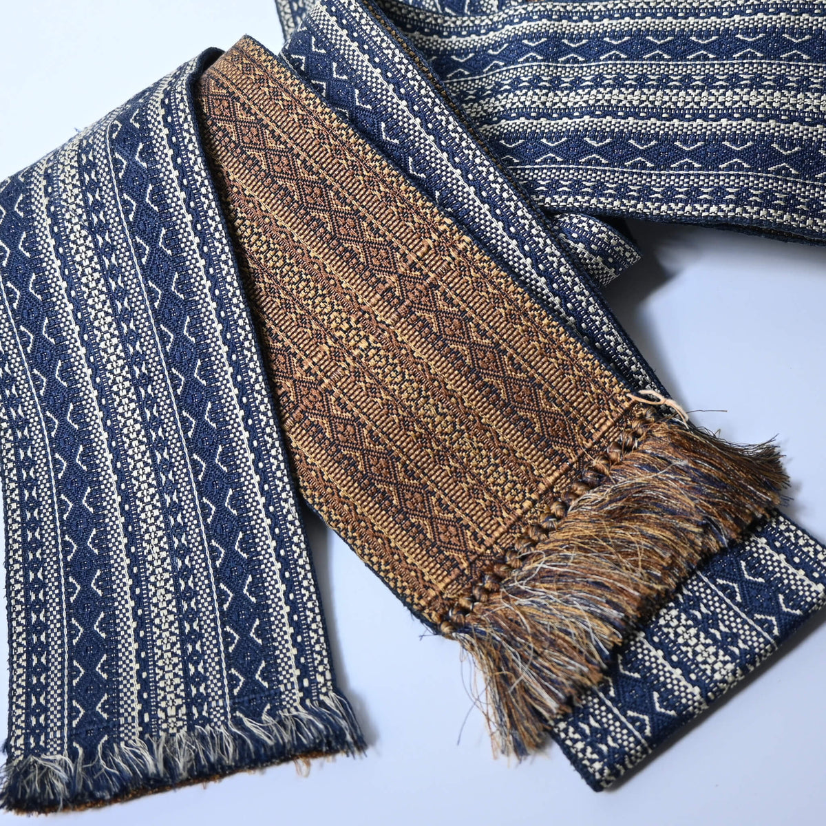 Vintage men's sash kaku obi with woven geometric pattern on both sides.