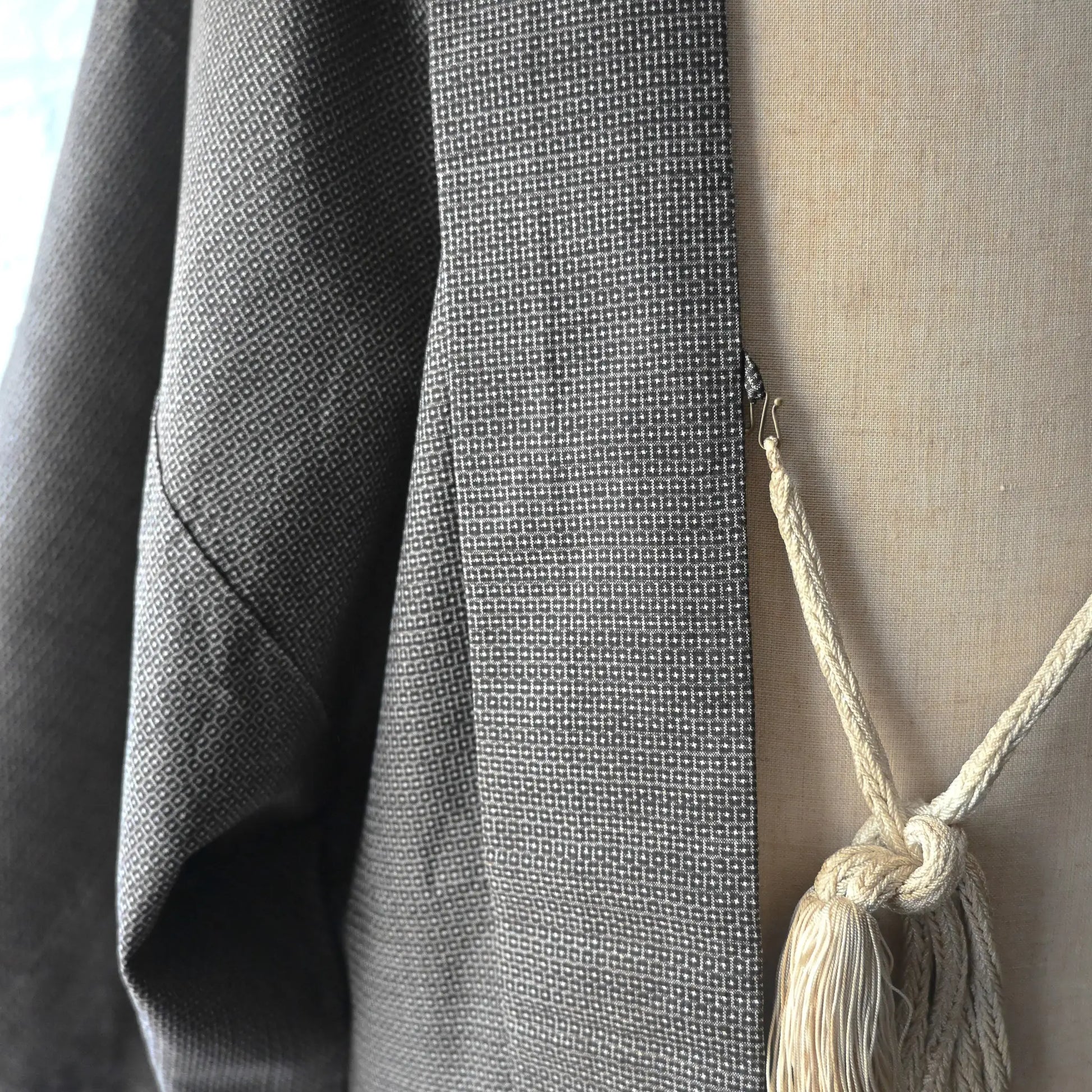 Close-up view of vintage Japanese men's silk haori with rare hand-painted Shunga on the lining.