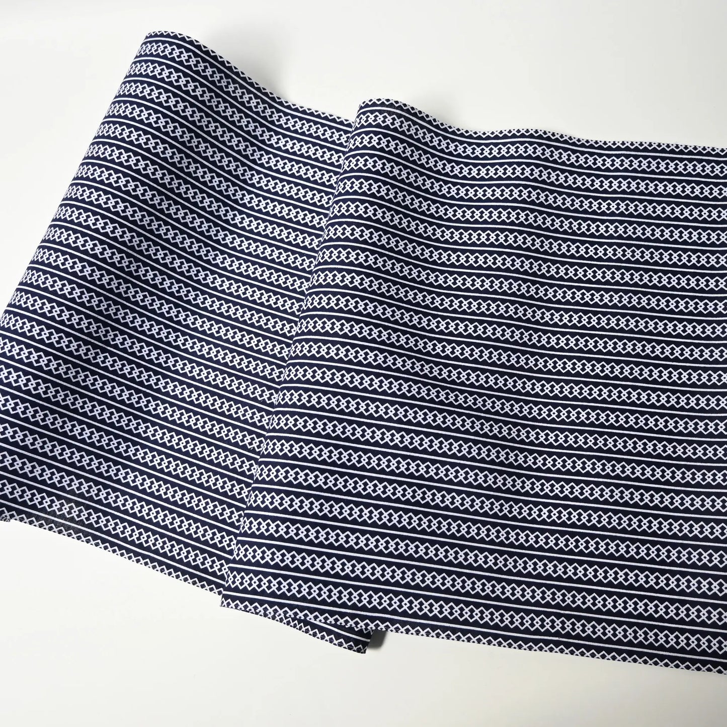 Full view of vintage Japanese men's yukata cotton in deep navy with traditional geometric pattern,  Yoshiwara-tsunagi.