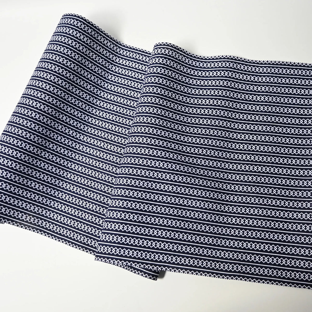 Full view of vintage Japanese men's yukata cotton in deep navy with traditional geometric pattern,  Yoshiwara-tsunagi.