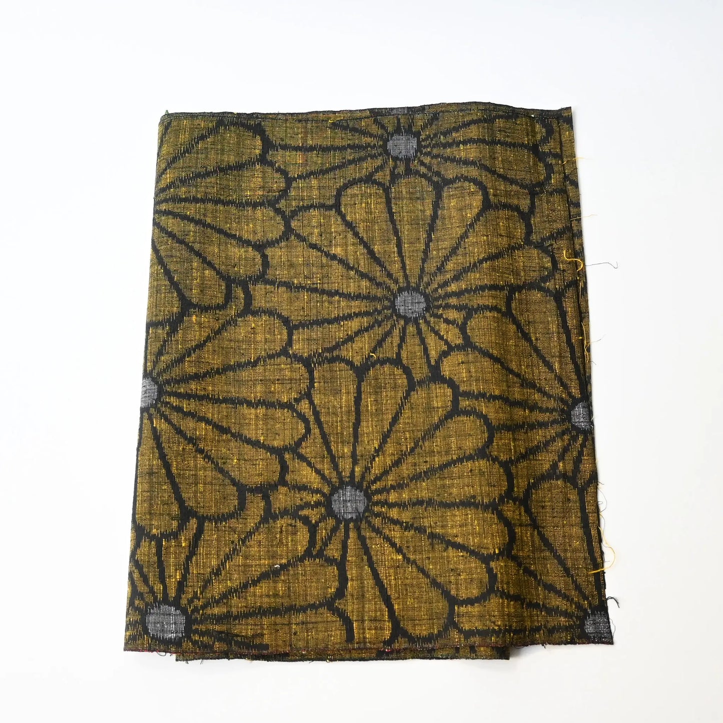 Vintage Japanese tsumugi silk kimono fabric with a bold chrysanthemum motif.