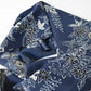 Detailed view of vintage Chirimen  silk crepe kimono fabric in navy with traditional Japanese seasonal flowers and trees.