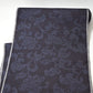 Full view of vintage navy tsumugi silk kimono fabric with peony foliage pattern, sold by the metre.