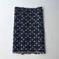 Vintage navy tsumugi silk kimono fabric with woven kasuri pattern.