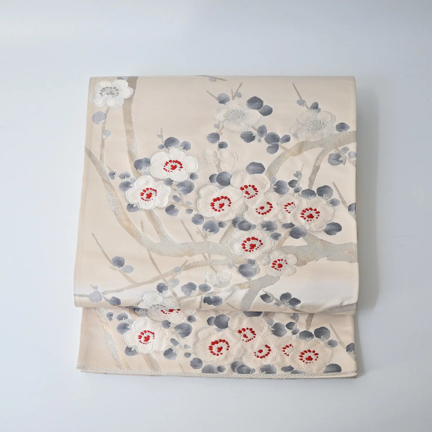 Vintage women's off-white silk fukuro obi with elegant plum blossom motif.