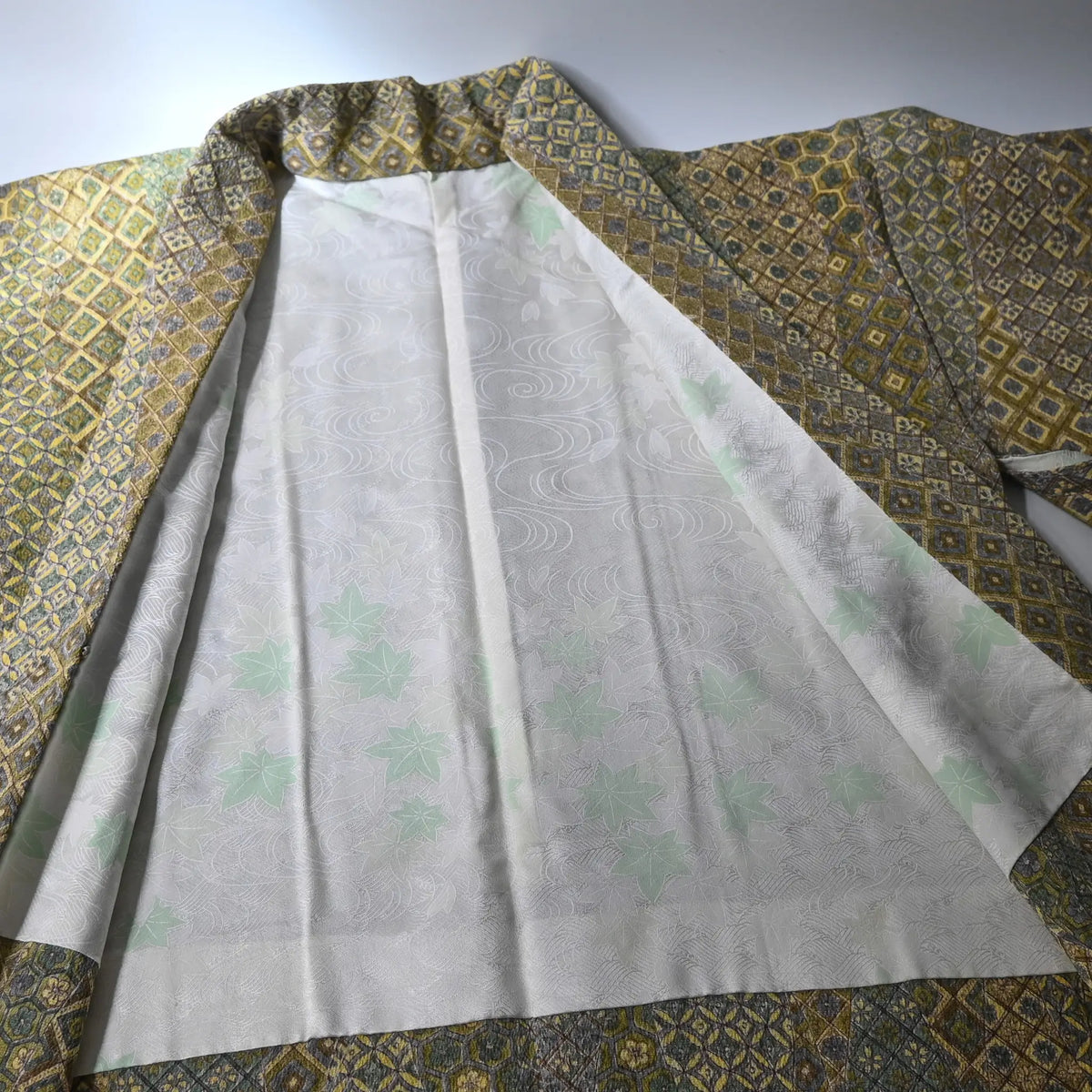 Vintage Japanese women's olive green silk crepe haori.