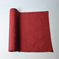 Vintage plain tsumugi silk kimono fabric in brick red tone, sold by the metre.