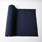 Vintage plain tsumugi silk kimono fabric in deep blue sold by the metre.