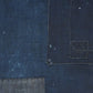 Detailed view of vintage Japanese plain deep  indigo cotton futon cover panel with patches.