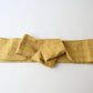 Vintage Japanese men's silk Kaku Obi with woven design in soft yellow.