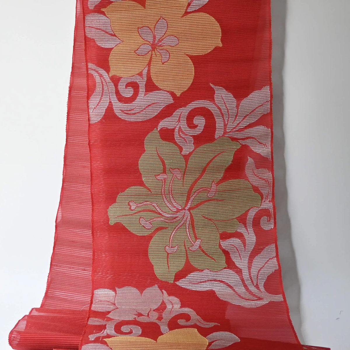 Hanging vintage Japanese red silk with bold lily and bellflower motifs.