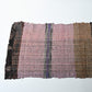 A section of vintage Sakiori fragment cloth from Tohoku region, woven from shredded strips of recycled kimono and futon covers.