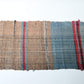 A section of vintage Sakiori fragment cloth from Tohoku region, woven from shredded strips of recycled kimono and futon covers.