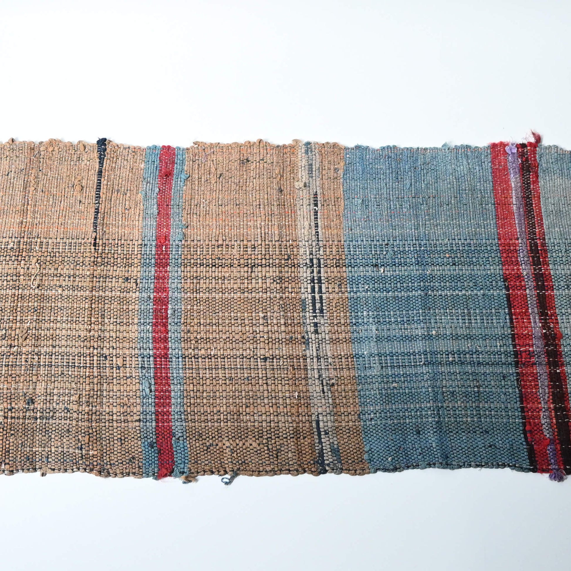 A section of vintage Sakiori fragment cloth from Tohoku region, woven from shredded strips of recycled kimono and futon covers.