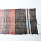 A section of vintage Sakiori fragment cloth from Tohoku region, woven from shredded strips of recycled kimono and futon covers.