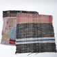 Full view of vintage Sakiori fragment cloth from Tohoku region, woven from shredded strips of recycled kimono and futon covers.