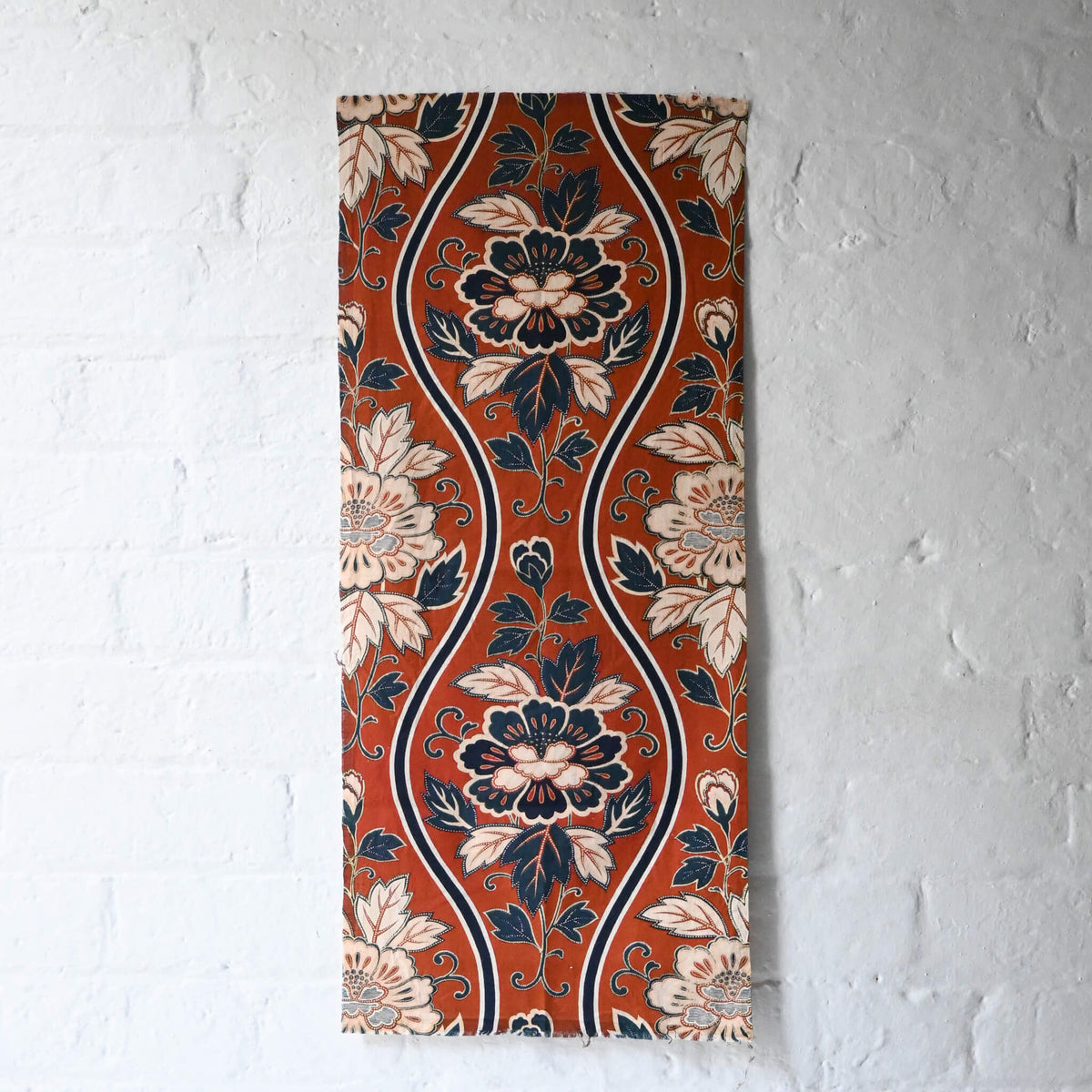 Vintage Japanese Sarasa cotton piece with peony pattern in warm rust orange and navy, inspired by imported chintz designs.