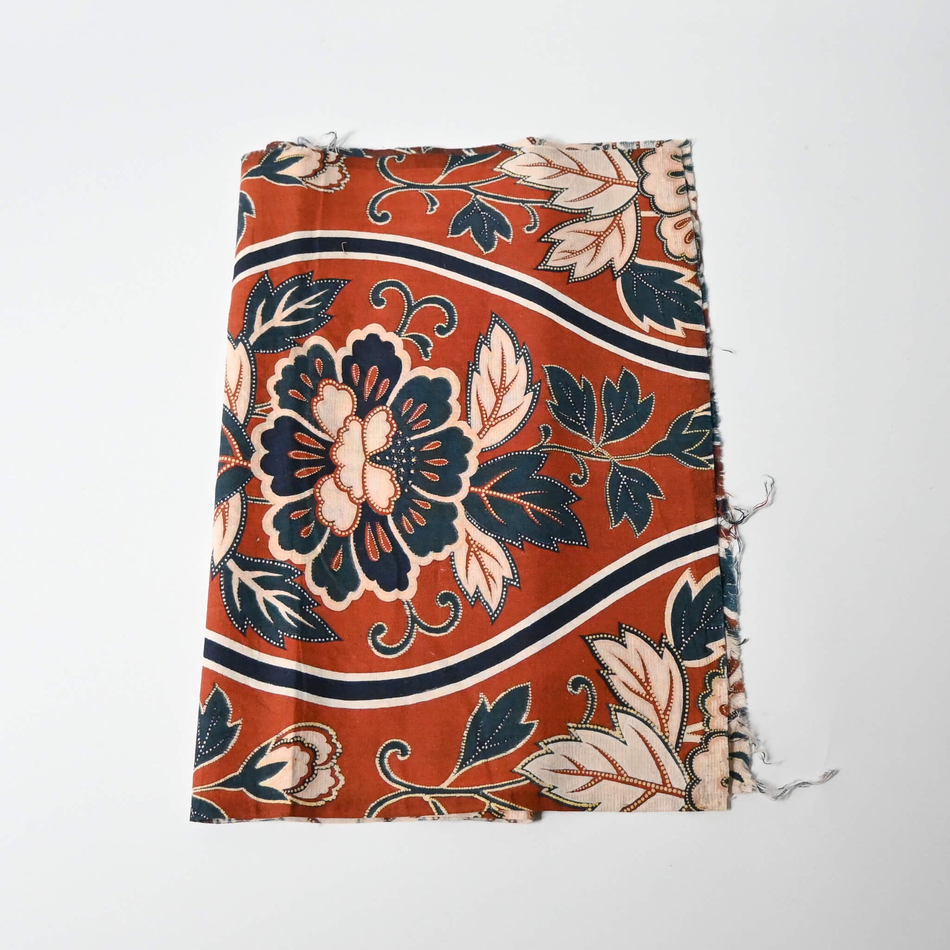 Vintage Japanese Sarasa cotton piece with peony pattern in warm rust orange and navy, inspired by imported chintz designs.