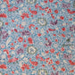 Vintage silk crepe kimono fabric piece with Sarasa floral and bird patten in soft blue.