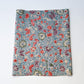 Vintage silk crepe kimono fabric piece with Sarasa floral and bird patten in soft blue.