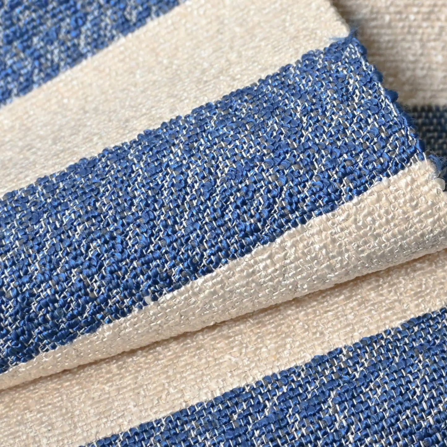 Close-up view of vintage blue and white striped obi woven with Shifu paper yarn.