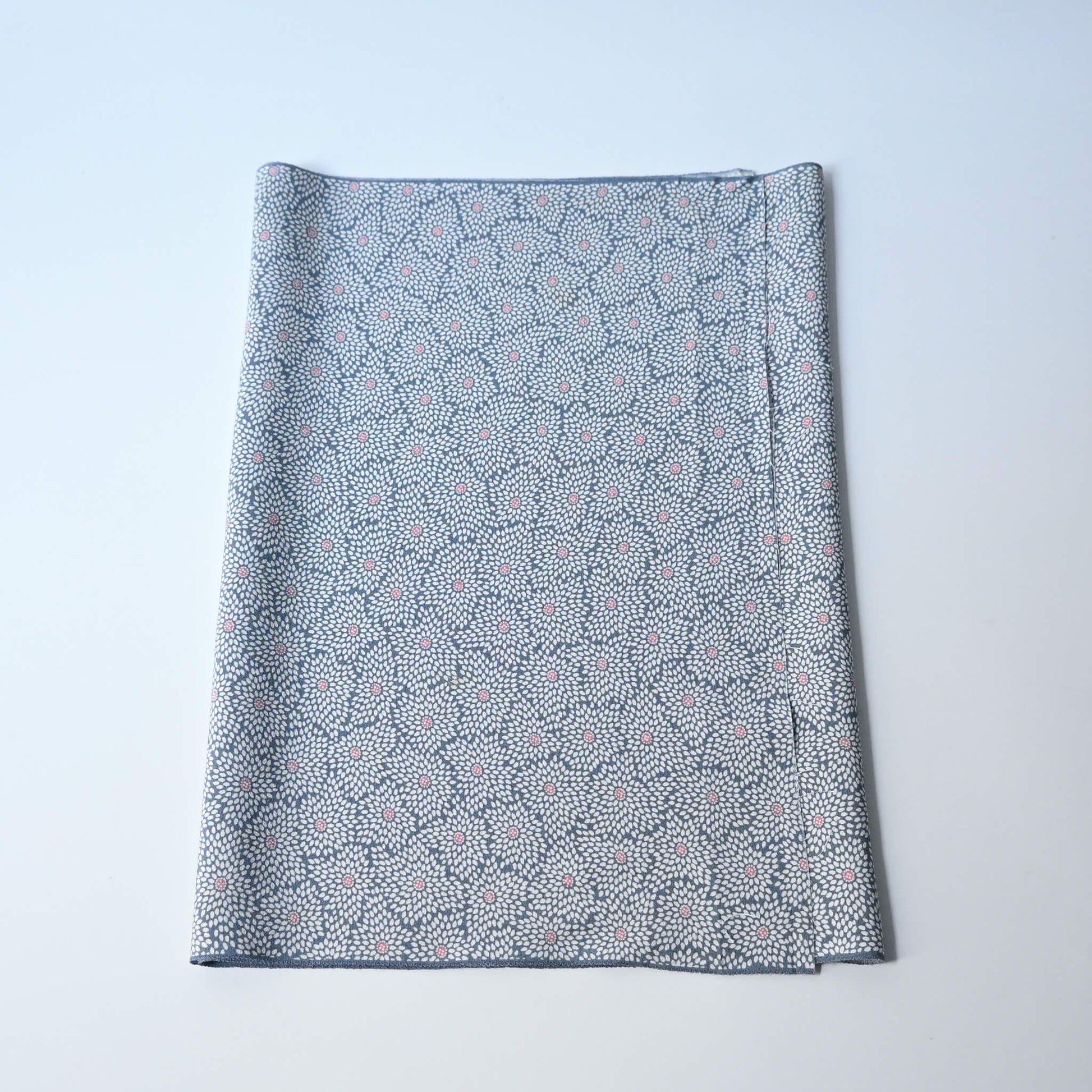 Vintage silk crepe kimono fabric in pale grey-blue with all over chrysanthemum pattern.