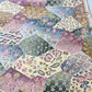 Detailed view of vintage silk Jacquard kimono fabric in pastel colour with gorgeous floral pattern. 